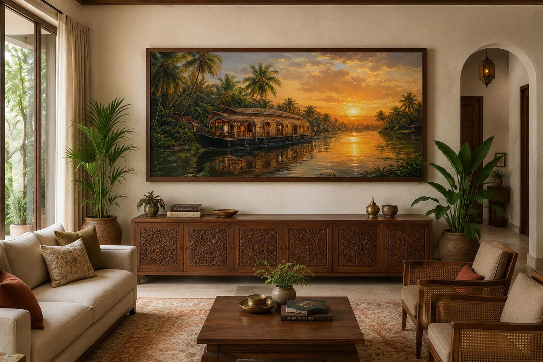 Kerala backwaters houseboat painting at sunset on a living room wall above a wooden console.
