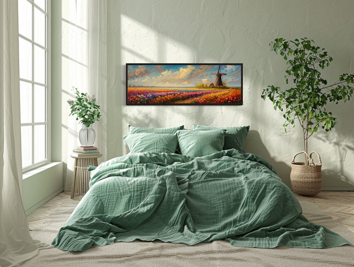 Keukenhof Gardens and windmill panoramic framed canvas wall art above a bed in a green bedroom.