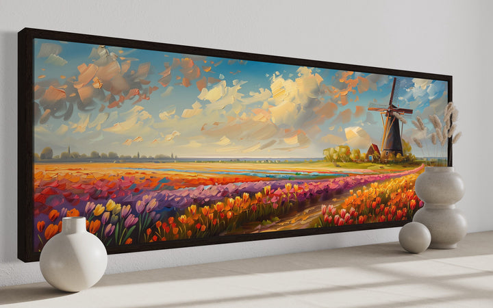 Panoramic framed canvas art of a Dutch windmill and vibrant tulip fields in Keukenhof Gardens.