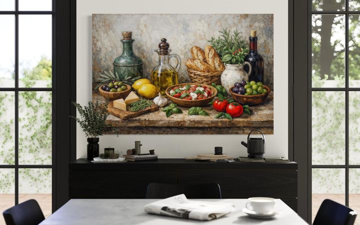 A Mediterranean food still life canvas print hangs above a sideboard in a modern dining room.