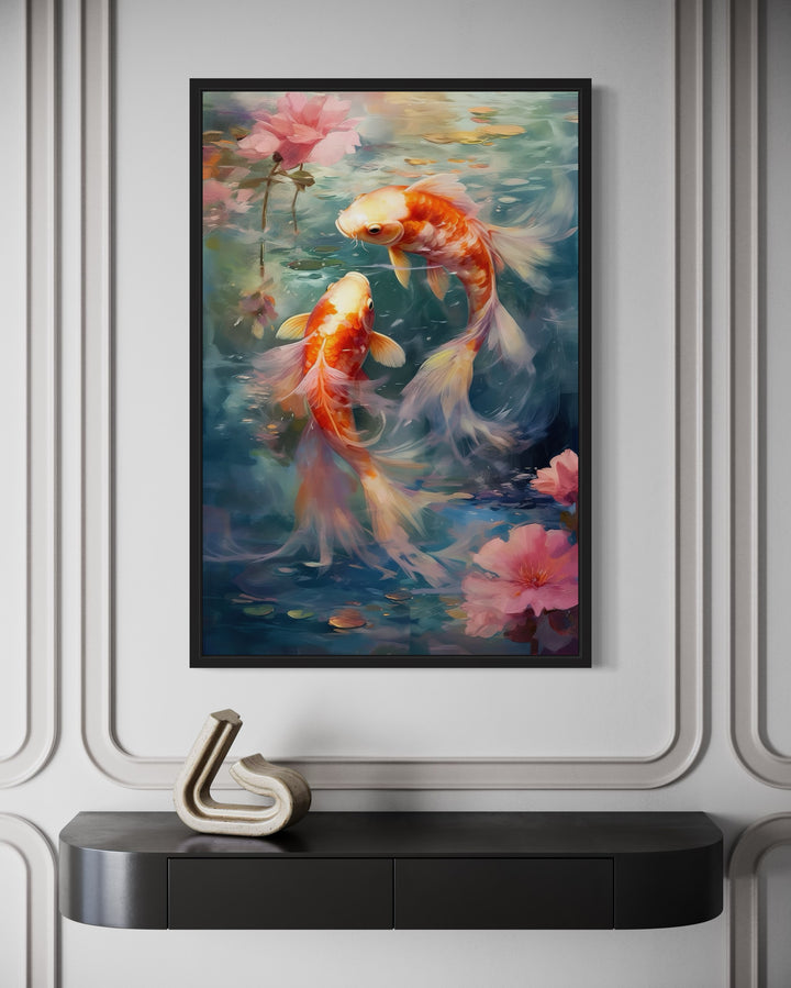 Koi Fish Zen Japanese Framed Canvas Wall Art featuring orange koi and pink flowers on a white wall.