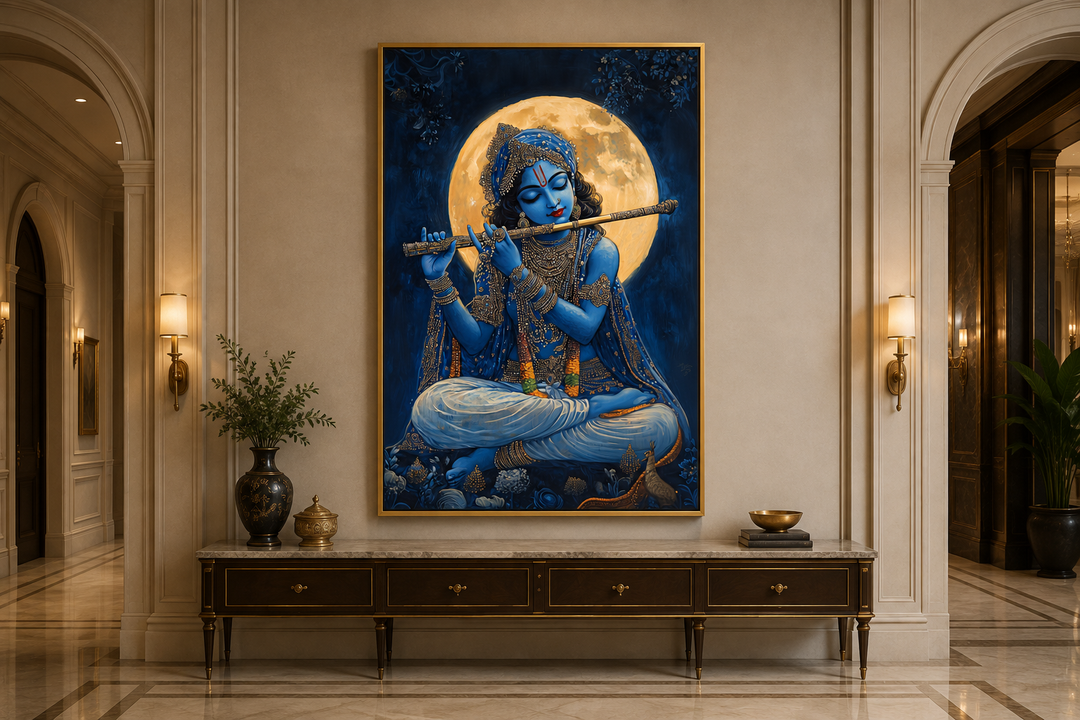 Blue Krishna playing flute under a full moon framed canvas wall art above a console table.