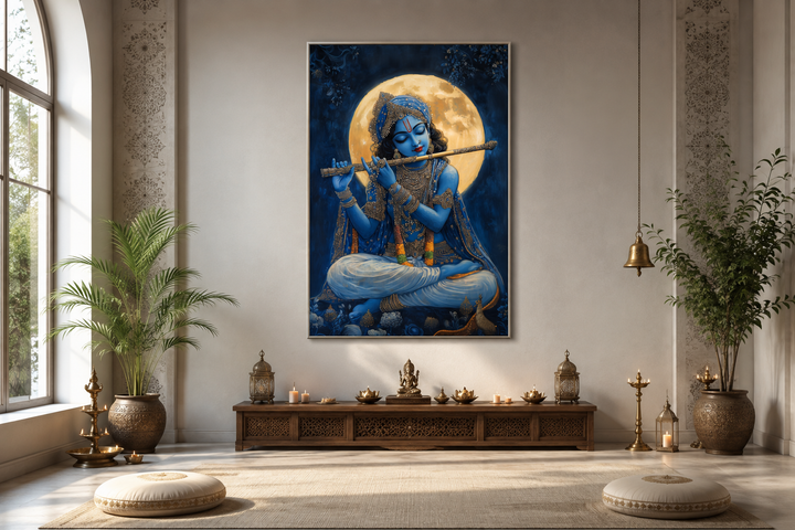 Blue Krishna playing flute under a full moon framed canvas wall art in a serene meditation room.