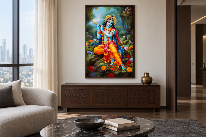 Lord Krishna playing flute in Vrindavan forest framed canvas wall art above a dark wood sideboard.