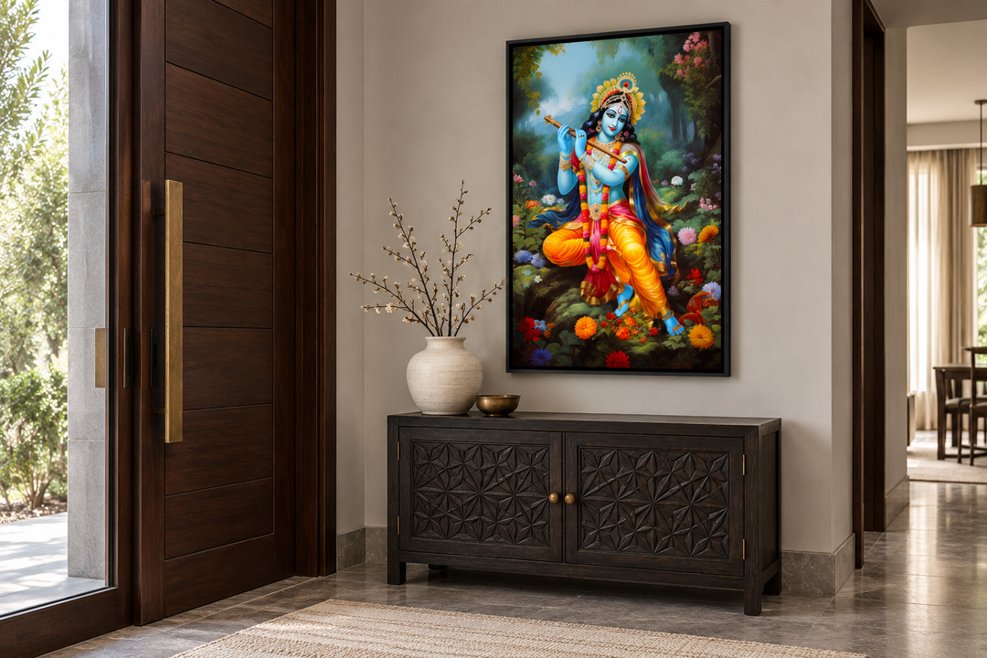 Lord Krishna playing flute in Vrindavan forest framed canvas wall art above a dark wood sideboard.