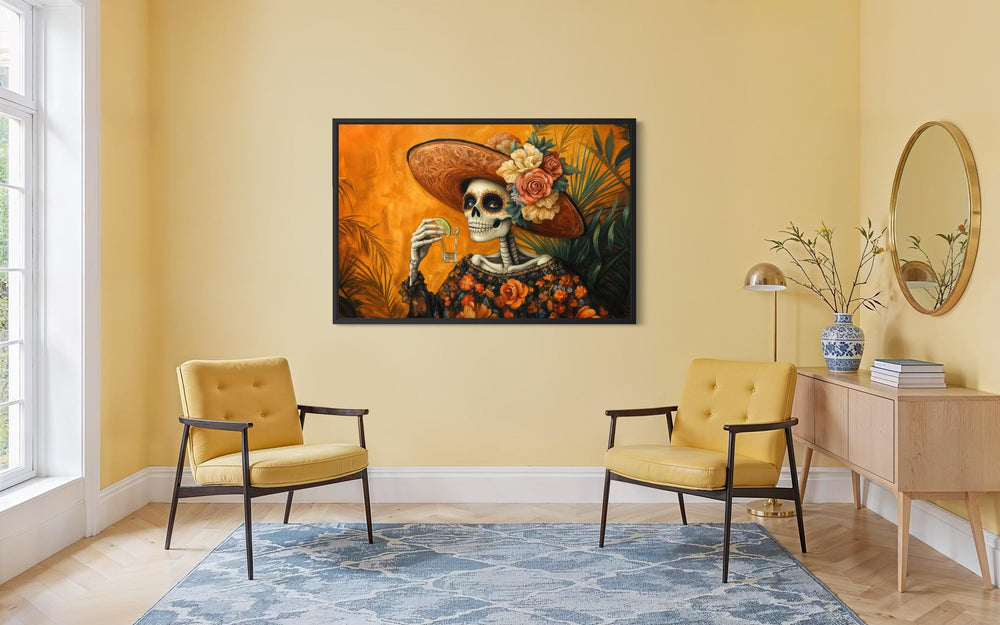 La Calavera Catrina Mexican canvas wall art featuring a skeleton drinking tequila in a yellow room.