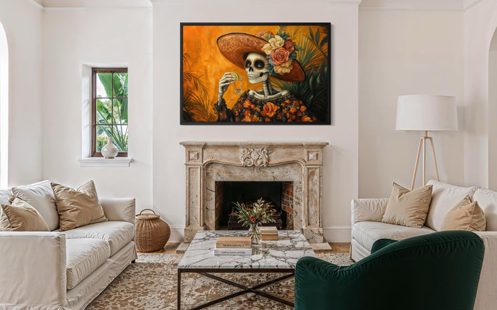 La Calavera Catrina Mexican canvas wall art hanging above a fireplace in a bright living room.