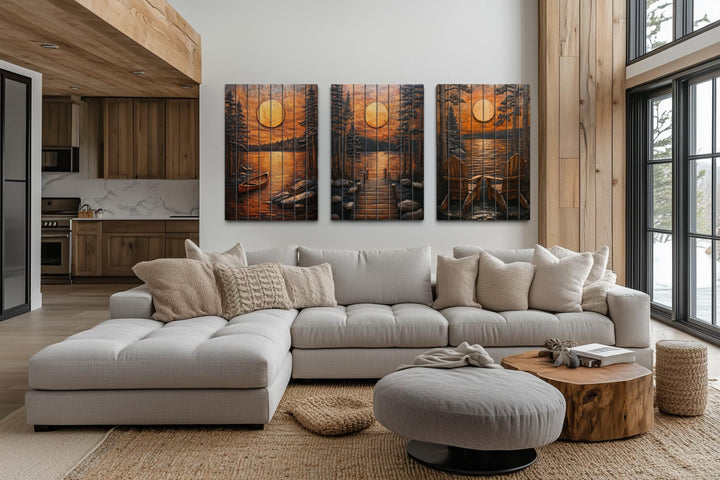 Three-panel rustic wood wall art featuring a sunset lake scene with a dock, canoe, and chairs.