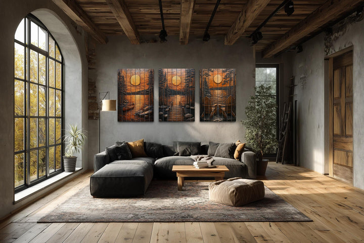 Three-panel rustic wood wall art set featuring a lake sunset with a dock, canoe, and chairs.