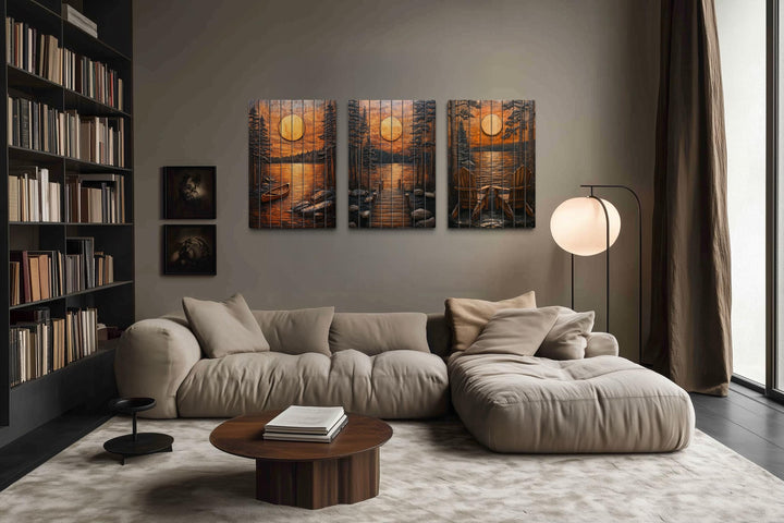 Set of three rustic wood wall art panels featuring a lake sunset with a dock, canoe, and chairs.