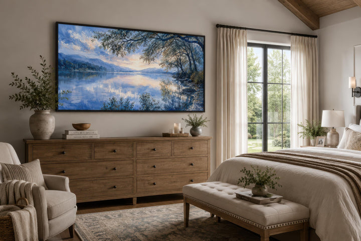 Blue Lake Painting Framed Canvas Print of a serene landscape above a wooden dresser in a bedroom.