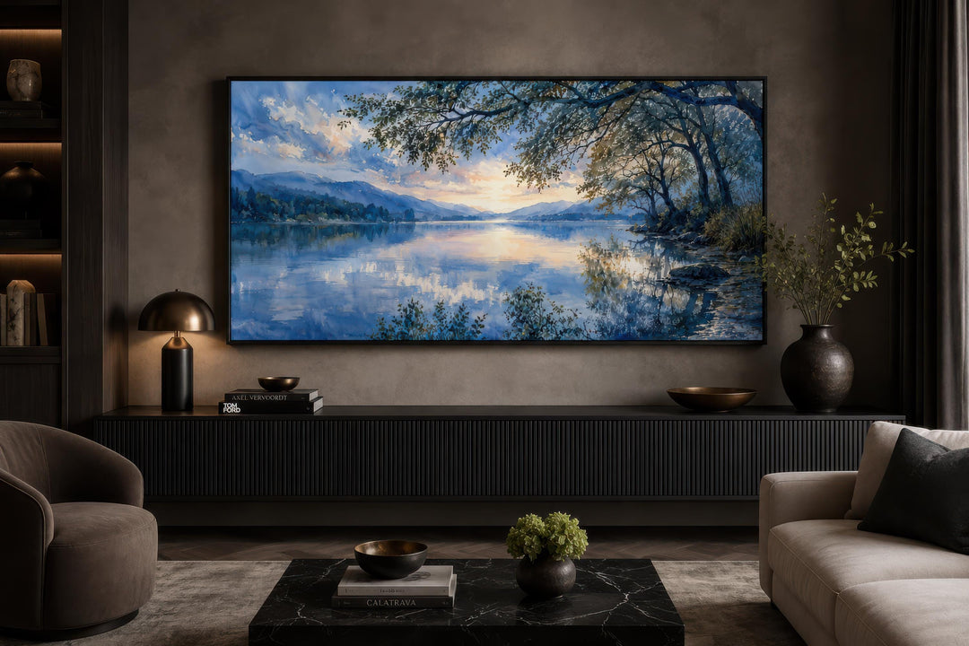 Framed blue lake painting canvas print displayed above a console in a modern living room.