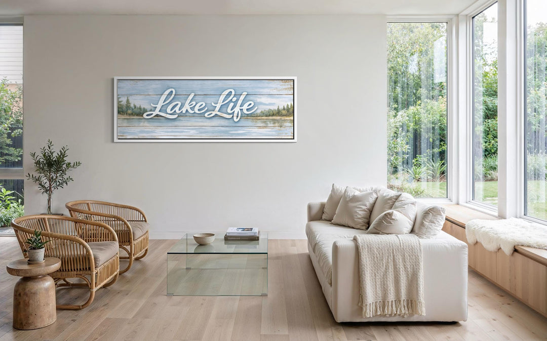 A large panoramic canvas wall art featuring Lake Life script over a rustic lakeside landscape.
