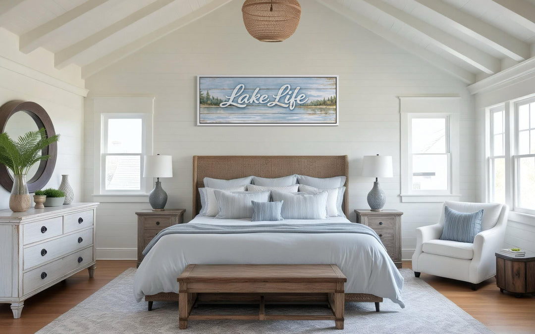 Large horizontal panoramic Lake Life canvas wall art displayed above a bed in a rustic bedroom.