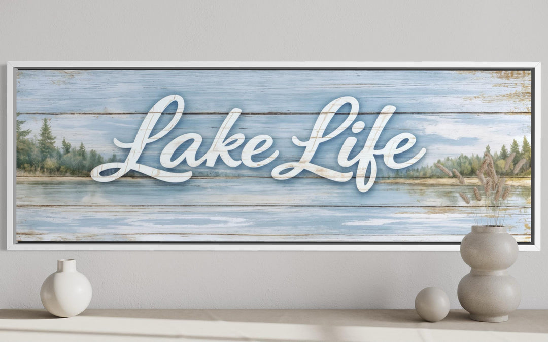 Panoramic Lake Life canvas wall art with white script over a rustic blue wood and lake landscape.