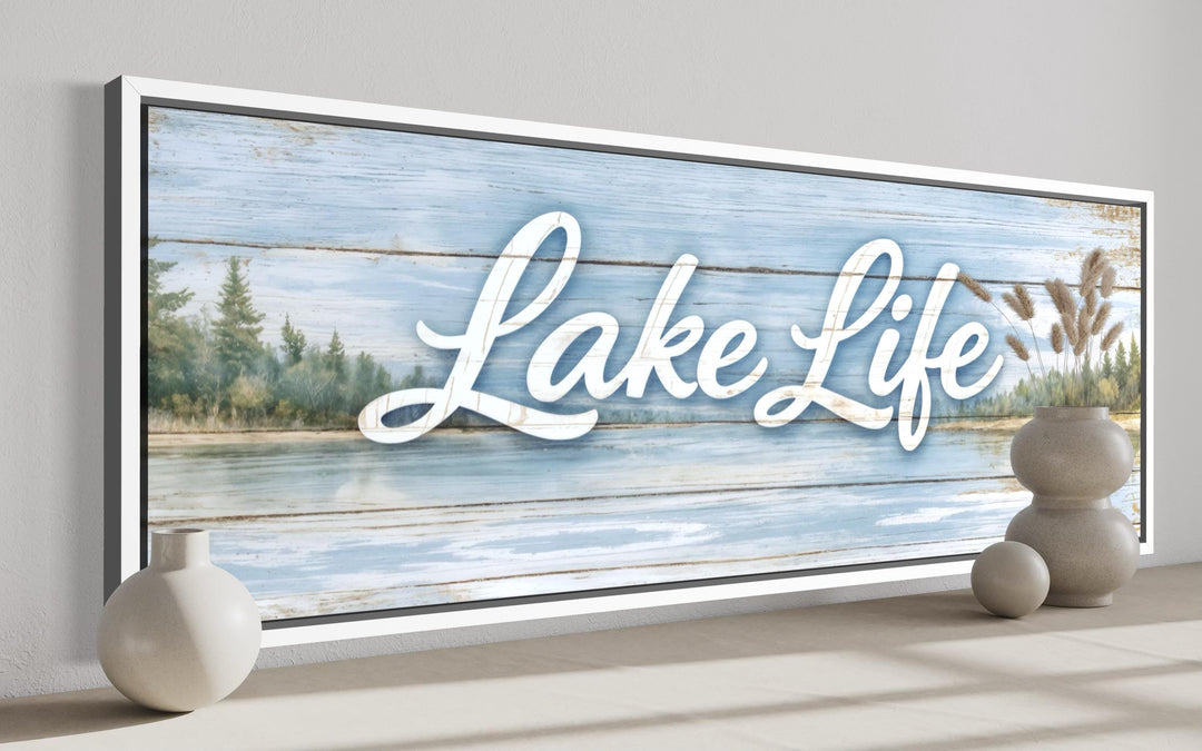 Panoramic canvas wall art with 'Lake Life' script over a serene blue lake and forest landscape.