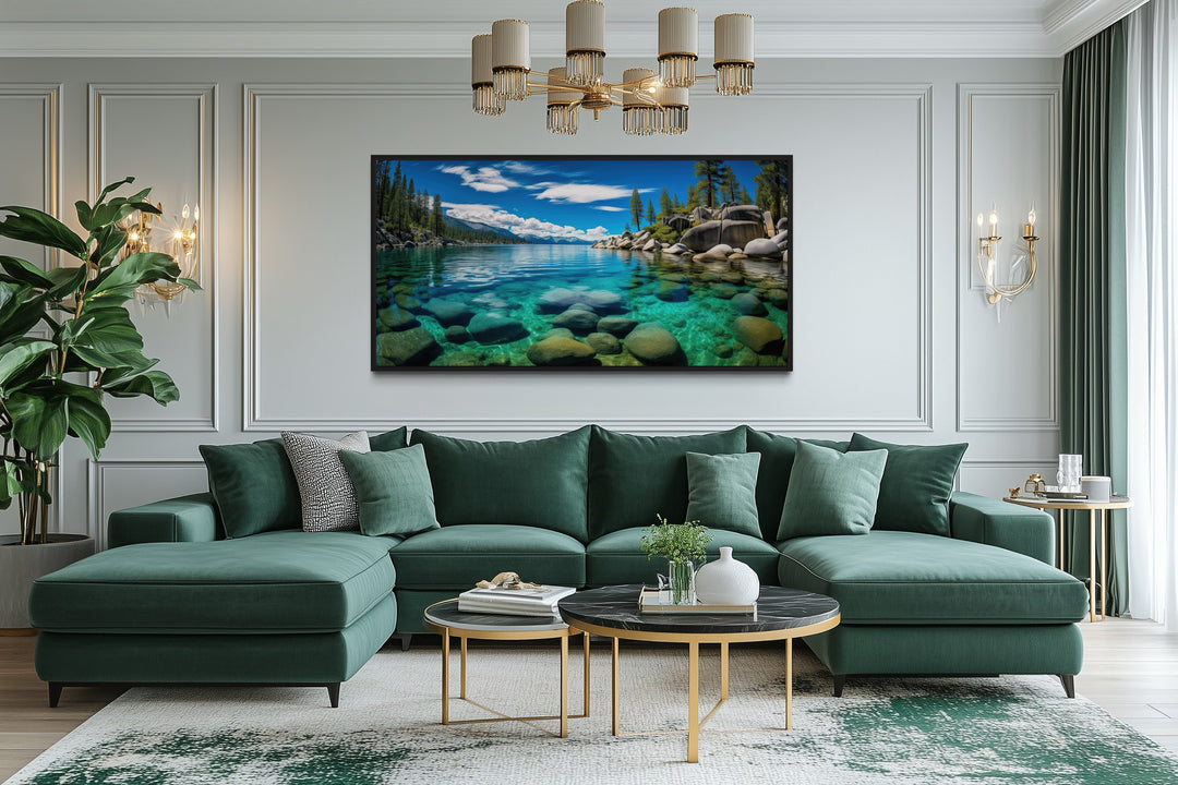 Framed canvas print of Lake Tahoe's Sand Harbor landscape above a green sofa in a modern living room.
