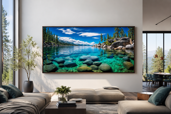 Framed Lake Tahoe wall art featuring Sand Harbor's clear blue water and rocks in a modern living room.