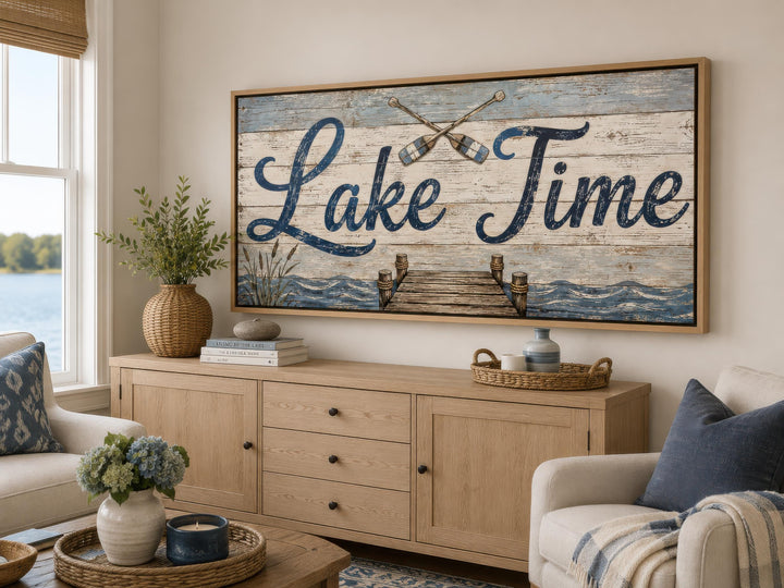 Rustic Lake Time canvas wall art with teal script and a dock scene above a wooden sideboard.