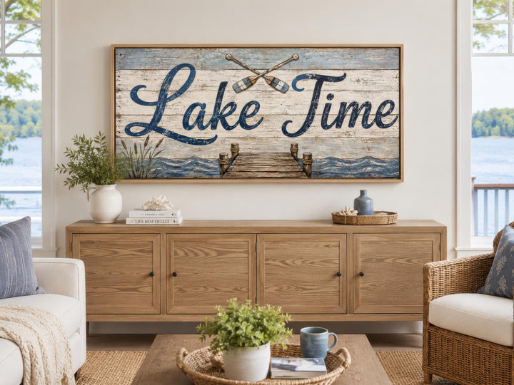 Rustic Lake Time canvas wall art with oars and dock over a wooden sideboard in a lake house room.