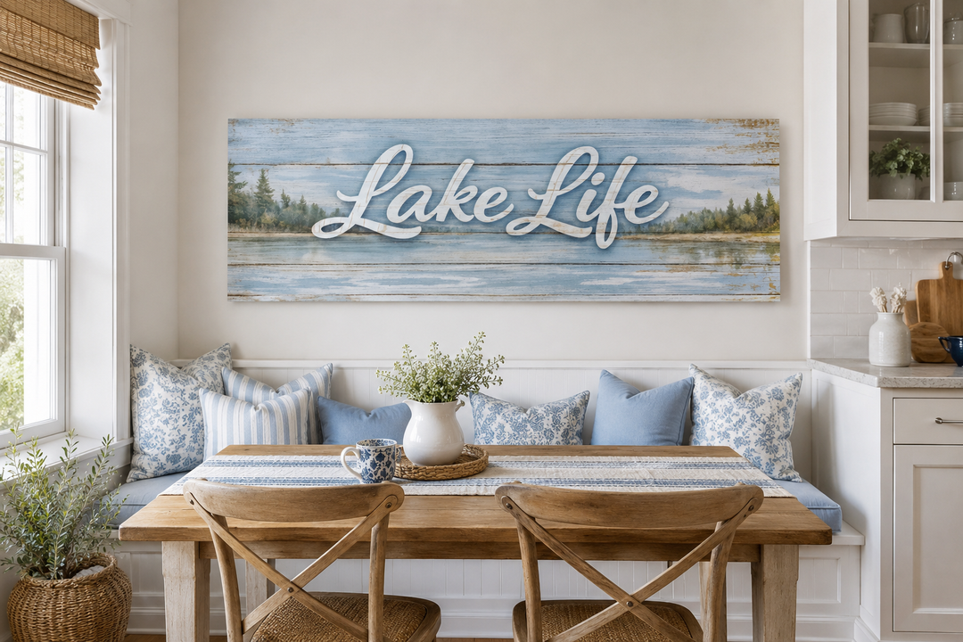 Large horizontal panoramic canvas wall art with "Lake Life" script over a rustic blue lake scene.
