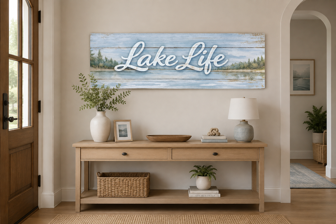 Lake Life panoramic canvas wall art with rustic blue wood background above a wooden console table.