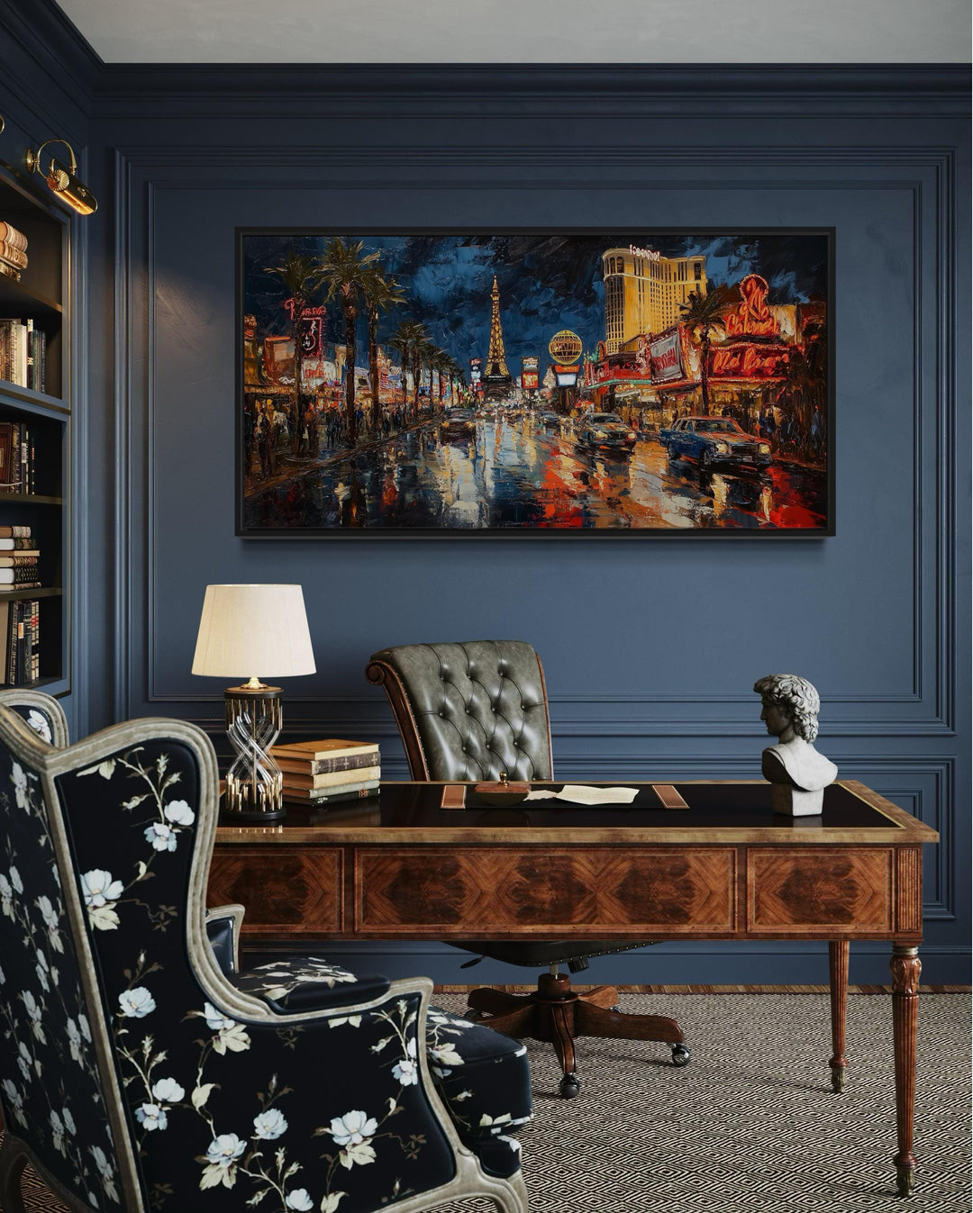 Las Vegas Strip At Night Framed Canvas Wall Art in an oil painting style above a classic wood desk.