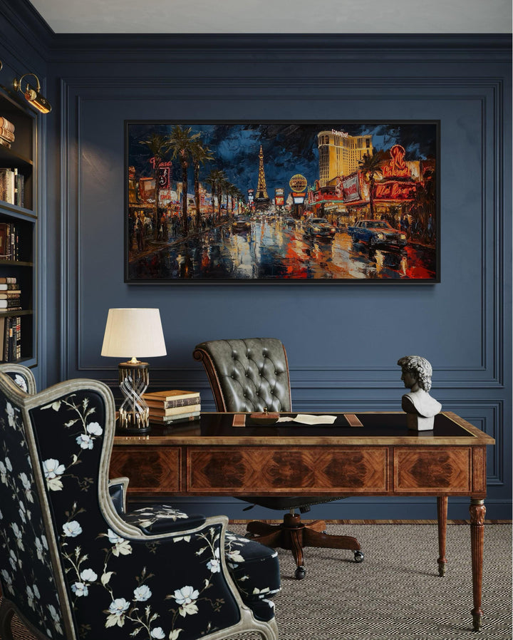 Las Vegas Strip At Night Framed Canvas Wall Art in an oil painting style above a classic wood desk.