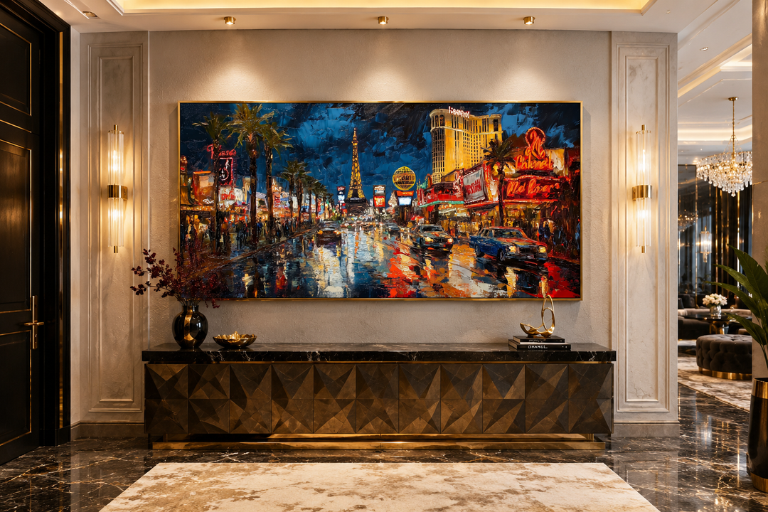 Las Vegas Strip at night framed canvas wall art above a dark textured sideboard in a modern room.
