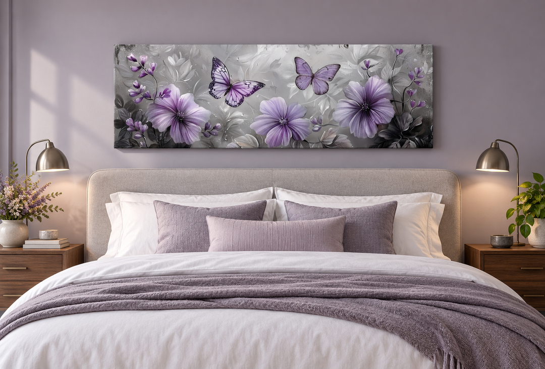 Horizontal canvas wall art with purple flowers and butterflies above a bed in a lavender bedroom.
