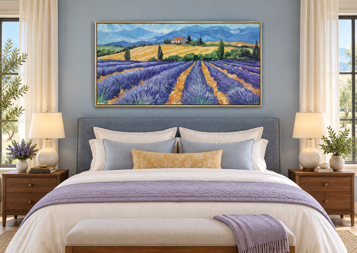 Panoramic lavender field canvas print in a gold frame above a bed in a blue-walled bedroom.