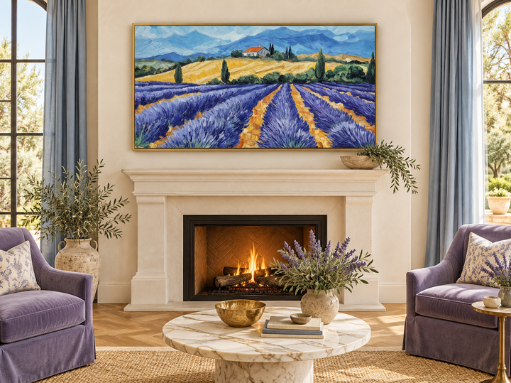 Panoramic lavender field canvas print in a gold frame above a fireplace in a rustic living room.