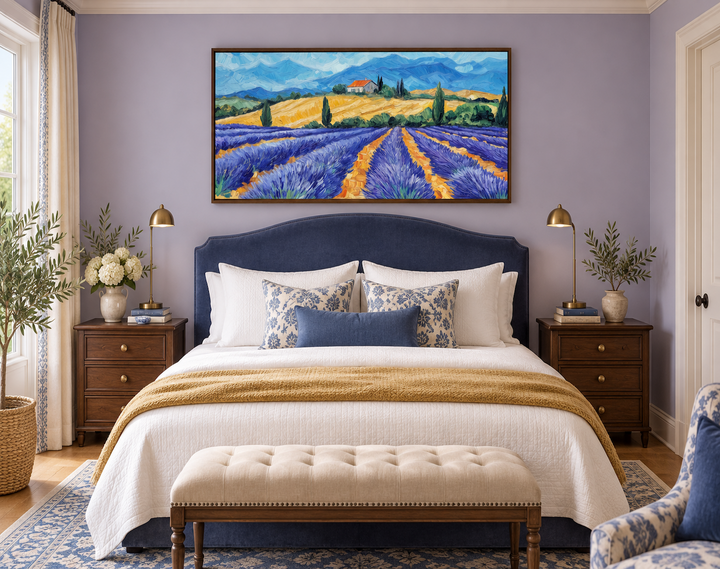 Panoramic lavender field canvas print in a walnut frame above a blue velvet bed in a bedroom.