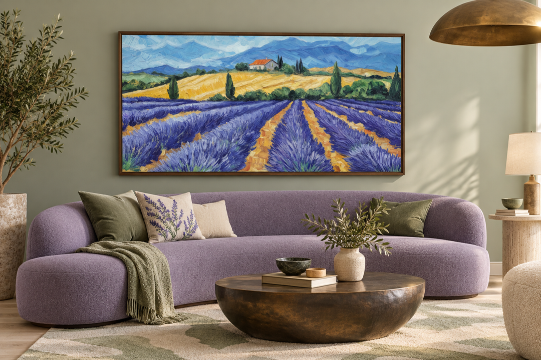 Panoramic lavender field canvas print in a walnut frame above a purple sofa in a rustic living room.