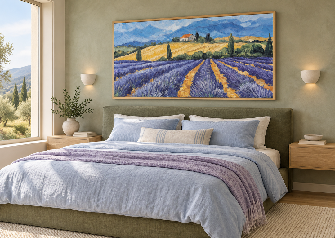 Panoramic lavender field canvas print in a light wood frame above a bed in a sage green bedroom.