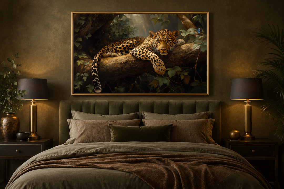 Framed canvas wall art of a leopard resting on a tree branch in a jungle, hung above a bed.