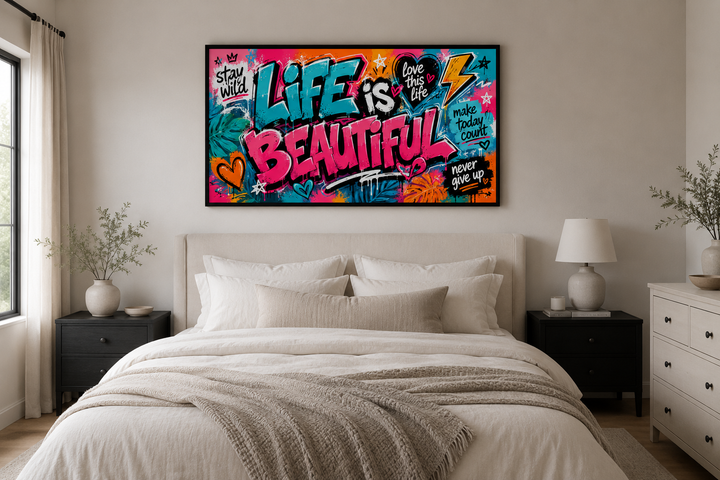 Life Is Beautiful graffiti framed canvas wall art above a bed in a modern bedroom.