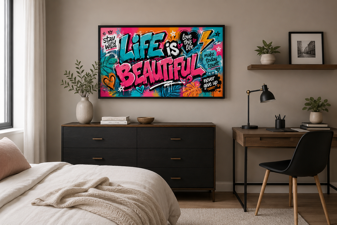 Life Is Beautiful graffiti framed canvas wall art in a modern bedroom above a black dresser.