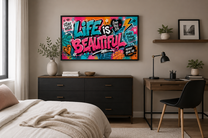 Life Is Beautiful graffiti framed canvas wall art in a modern bedroom above a black dresser.