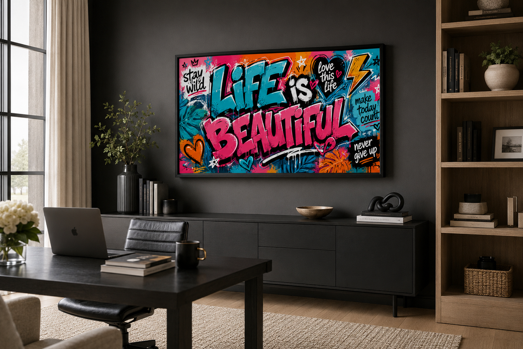 Life Is Beautiful graffiti framed canvas wall art in a modern black office with a desk and laptop.