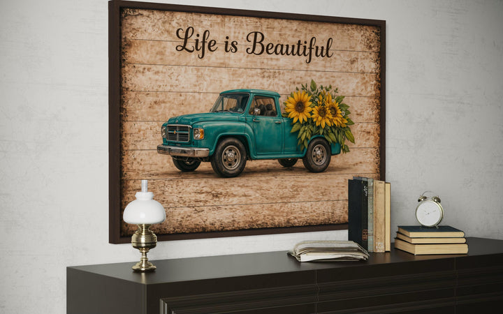 Life is Beautiful canvas wall art featuring a vintage teal farm truck and bright sunflowers.