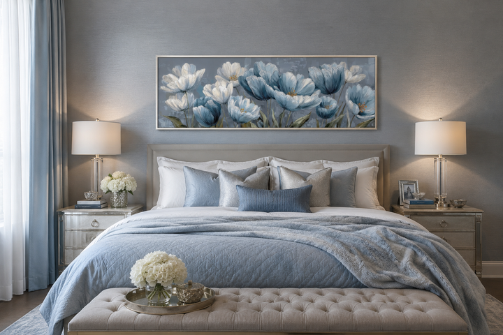 Light blue abstract floral wall art in a horizontal frame above a bed in a modern bedroom.