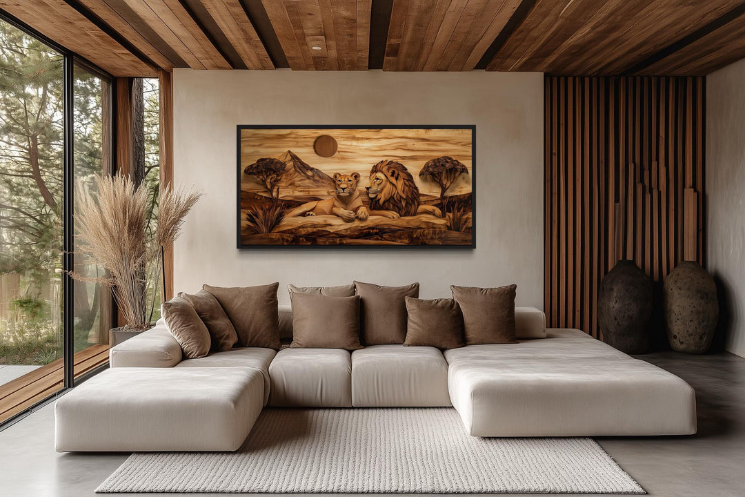 Lion and lioness couple wood texture canvas print hanging above a modern sofa in a rustic room.