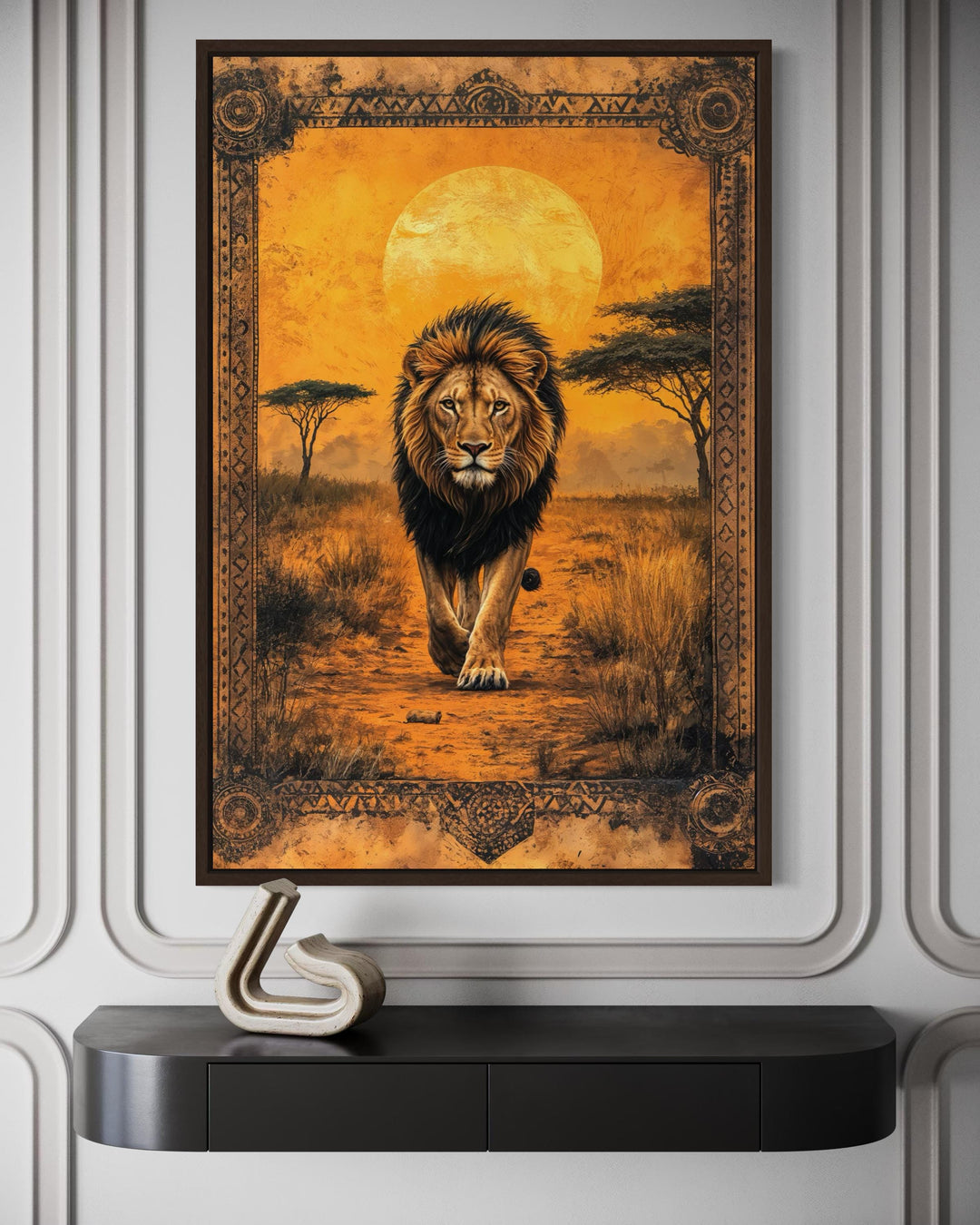 Framed canvas wall art of a lion walking through the African savanna at sunset with a golden moon.