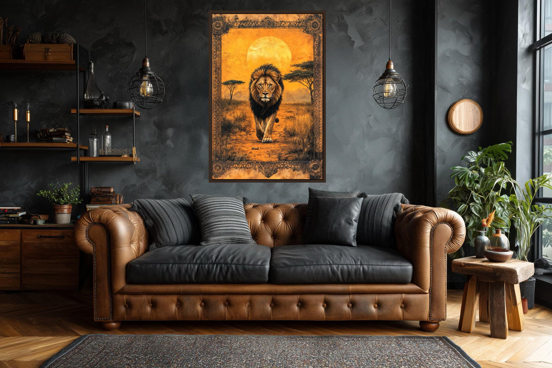 Lion in African savanna at sunset canvas wall art hanging above a brown leather sofa.