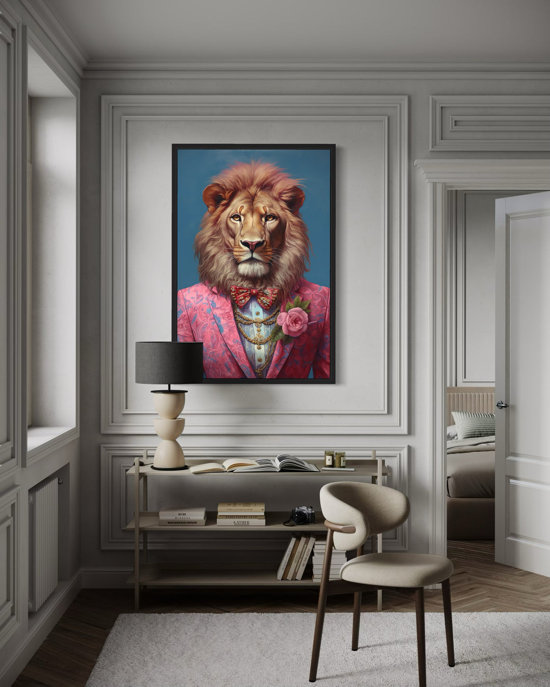 Framed canvas wall art of a lion in a pink suit and bow tie, displayed in a modern room.