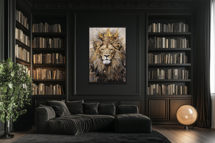 Lion King with crown framed canvas wall art centered in a dark, modern library with a black sofa.