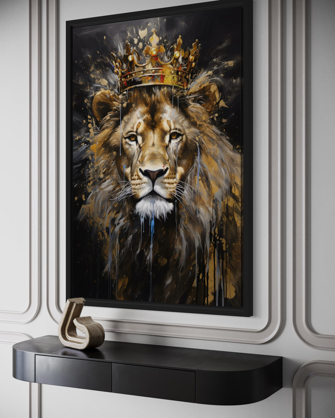 Lion King with Crown framed canvas wall art above a black console table in a modern room.