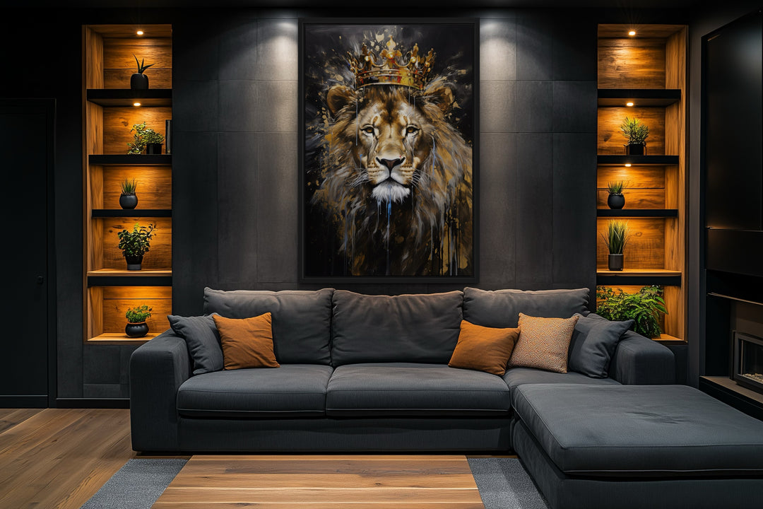 Framed canvas wall art of a lion wearing a gold crown, displayed in a modern man cave setting.