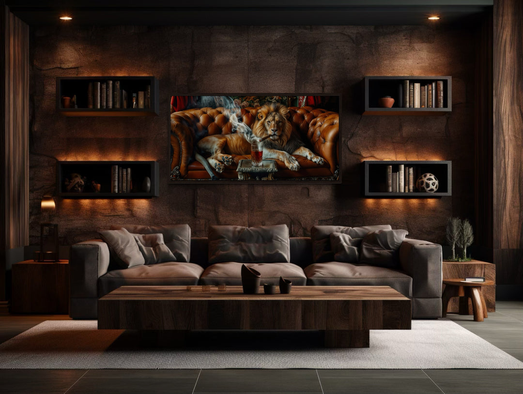 Lion smoking a cigar on a couch framed canvas print displayed in a modern man cave living room.